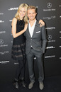 Model Karolina Kurkova and Nico Rosberg during the Mercedes Benz Fashion Week