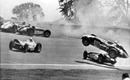 Pat O'Connor's car (No. 4) is airbourne after the first-lap pile-up - he died instantly when it rolled and hit the ground