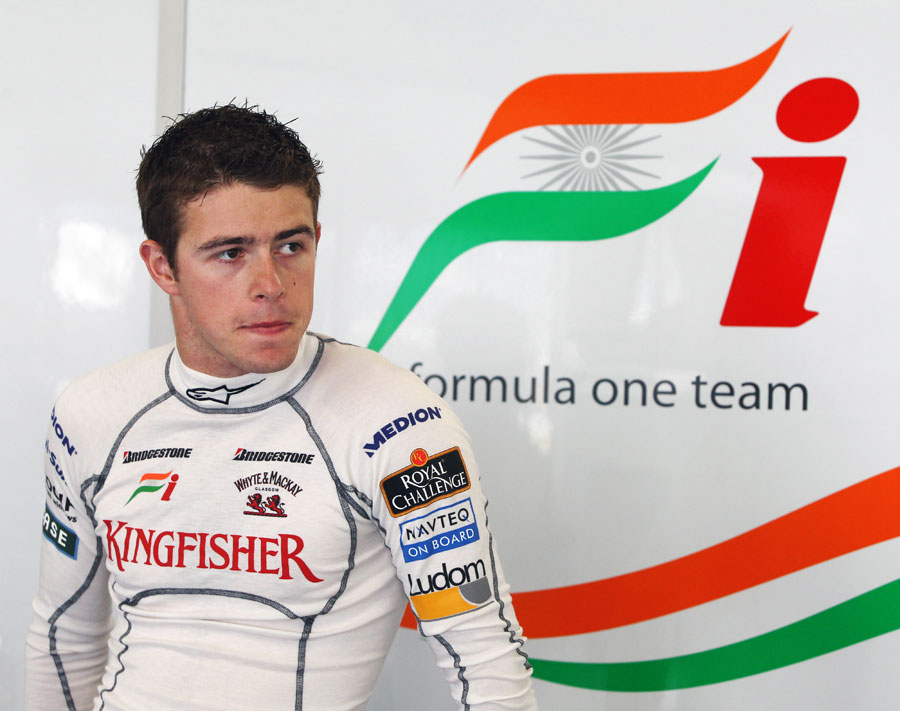 Paul di Resta takes a rest at the back of the Force India garage 