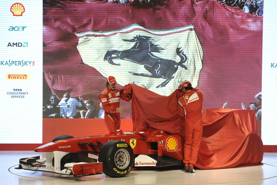 Fernando Alonso and Felipe Massa take the covers off the F150