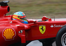 A close up of Fernando Alonso tackling the tight Fiorano test track in the new Ferrari F150