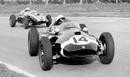 Stirling Moss, on his way to victory, leads Jack Brabham