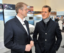 Michael Schumacher speaks with Mercedes' board member Thomas Weber