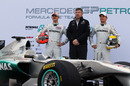 Michael Schumacher, Ross Brawn and Nico Rosberg with the new Mercedes WO2
