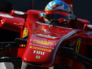Fernando Alonso on track in the Ferrari F150