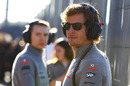 Jenson Button watches on from the pit lane