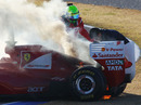 Felipe Massa's Ferrari caught fire early on the third day of testing