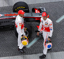 Lewis Hamilton and Jenson Button take a look at the new MP4-26