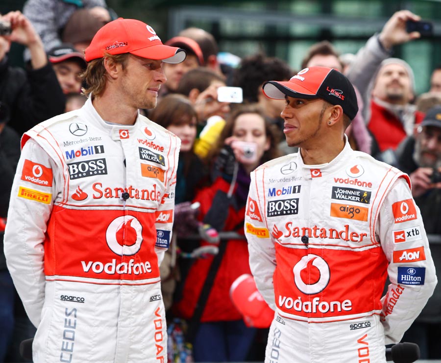 Jenson Button and Lewis Hamilton pose for the cameras
