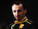 Robert Kubica poses for photos at the launch of the Renault R31