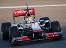 Lewis Hamilton clocks the first few miles on the McLaren MP4-26