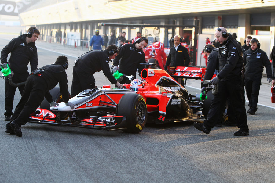 Timo Glock is pushed back into the pits in the new MVR-02