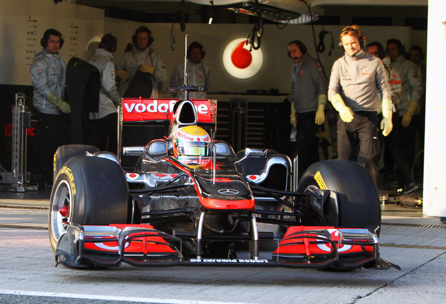 Lewis Hamilton leaves the garage in the brand-new McLaren MP4-26