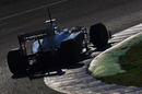 Sergio Perez takes plenty of kerb in the Sauber