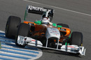 Adrian Sutil gets stuck in to a set of intermediates in the Force India