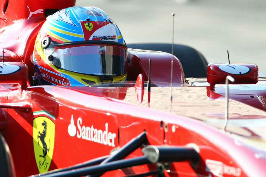 Fernando Alonso at the wheel of the Ferrari F150th Italia