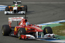 Fernando Alonso twists through the chicane