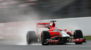 Timo Glock puts the Virgin through its paces in the wet