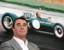 Nigel Mansell attends the opening of a Lotus showroom