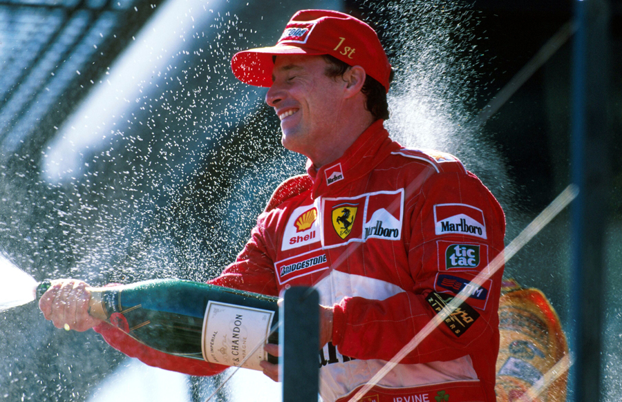 Ferrari's Eddie Irvine celebrates his win at Melbourne