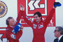 Niki Lauda congratulates Alain Prost on winning the Portuguese Grand Prix