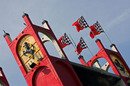 Ferrari flags fly from the top of the Imola tower