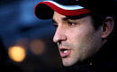Timo Glock talks to the press after a day of testing the new Virgin