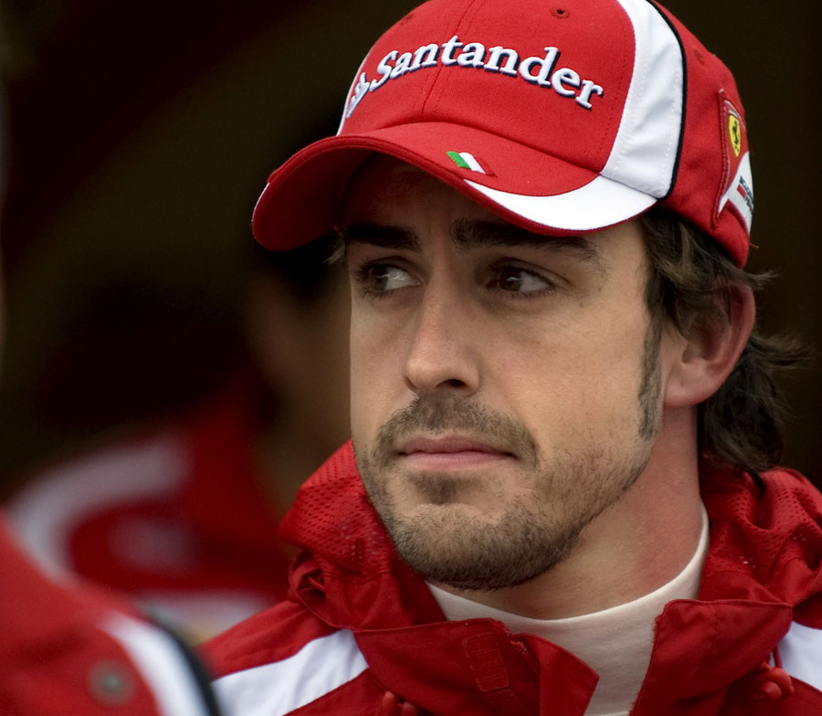 Fernando Alonso in the pit lane