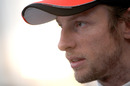 Jenson Button chats to the press after the first day of testing