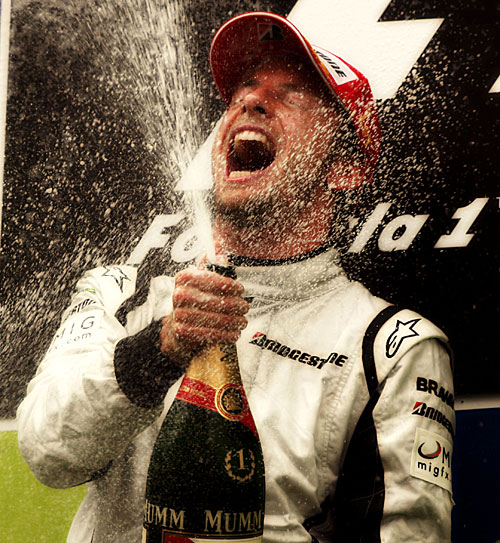 Jenson Button celebrates his victory