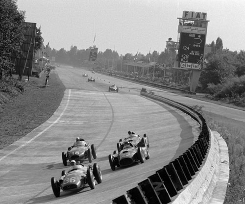 Stirling Moss with the offset-engine Maserati 250F leads the field at Monza