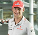 Jenson Button poses for photos in his new team uniform