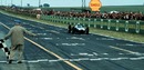 Jack Brabham crosses the line to win