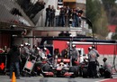 Lewis Hamilton pulls away from a McLaren pit stop
