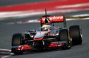 Lewis Hamilton avoids the kerbs in his McLaren MP4-26