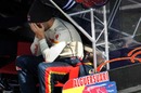Jaime Alguersuari takes a break after a long day in the Toro Rosso