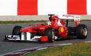 Fernando Alonso gets out on track in the newly revised Ferrari