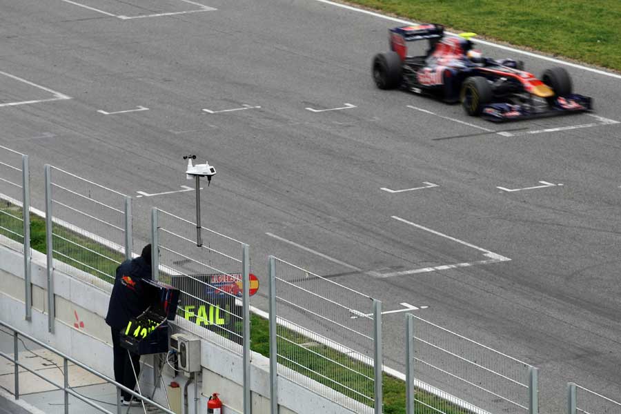 Jaime Alguersuari passes his pit board and starts another lap