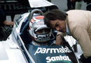 Brabham boss Bernie Ecclestone has a word with Nelson Piquet before the start