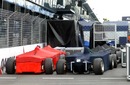 Cars arrive in the pit lane as preparations continue for the Australian Grand Prix