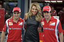 Felipe Massa and Fernando Alonso pose for photos with Australia Grand Prix ambassador Ashley Hart 