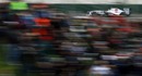 Kamui Kobayashi speeds past spectators at Albert Park
