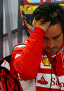 Fernando Alonso takes some time out in the Ferrari garage