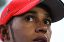 Lewis Hamilton talks to the press after qualifying