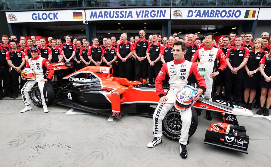 Virgin pose for a team photo with its completed driver line-up