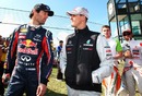 Mark Webber and Michael Schumacher exchange views as Paul di Resta and Lewis Hamilton follow them out to the drivers parade