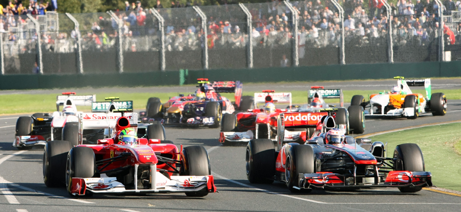 Felipe Massa  and Jenson Button battle at the start of the race
