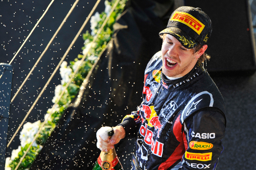 Sebastian Vettel leads the podium celebrations