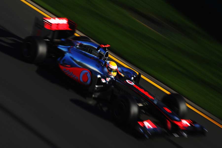 Lewis Hamilton pushes hard in pursuit of Sebastian Vettel