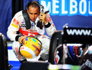 Lewis Hamilton takes a closer look at the race-winning Red Bull